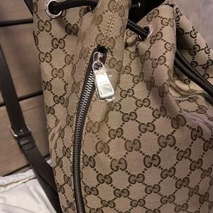 Gucci Monogram drawstring bucket backpack
